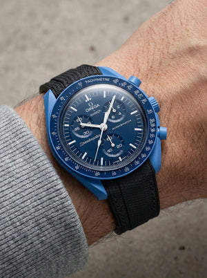 Black stitch rubber strap for Omega x Swatch MoonSwatch Mission to Neptune. 