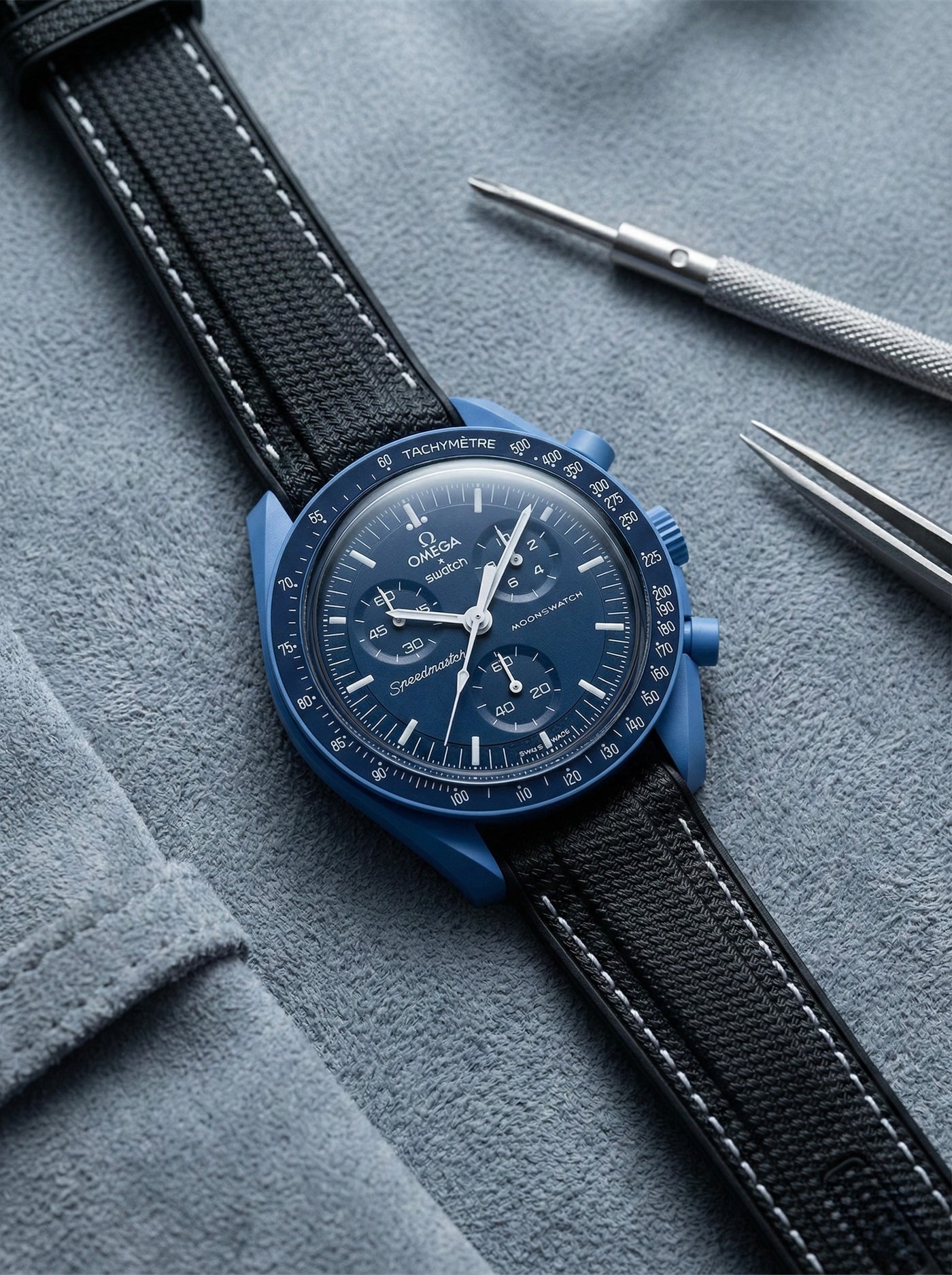 Black stitch rubber strap for Omega x Swatch MoonSwatch Mission to Neptune. 