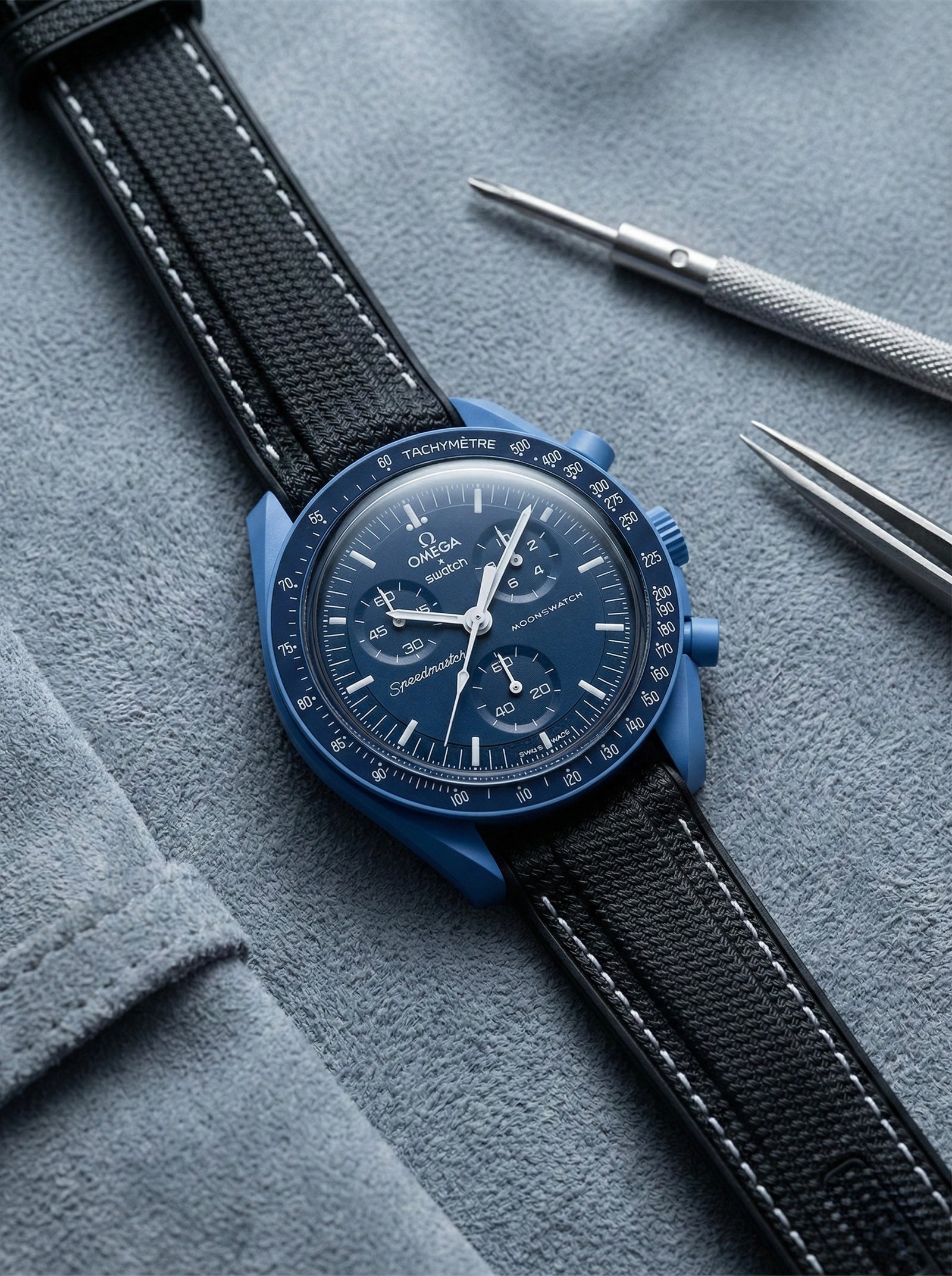 Black stitch rubber strap for Omega x Swatch MoonSwatch Mission to Neptune. 